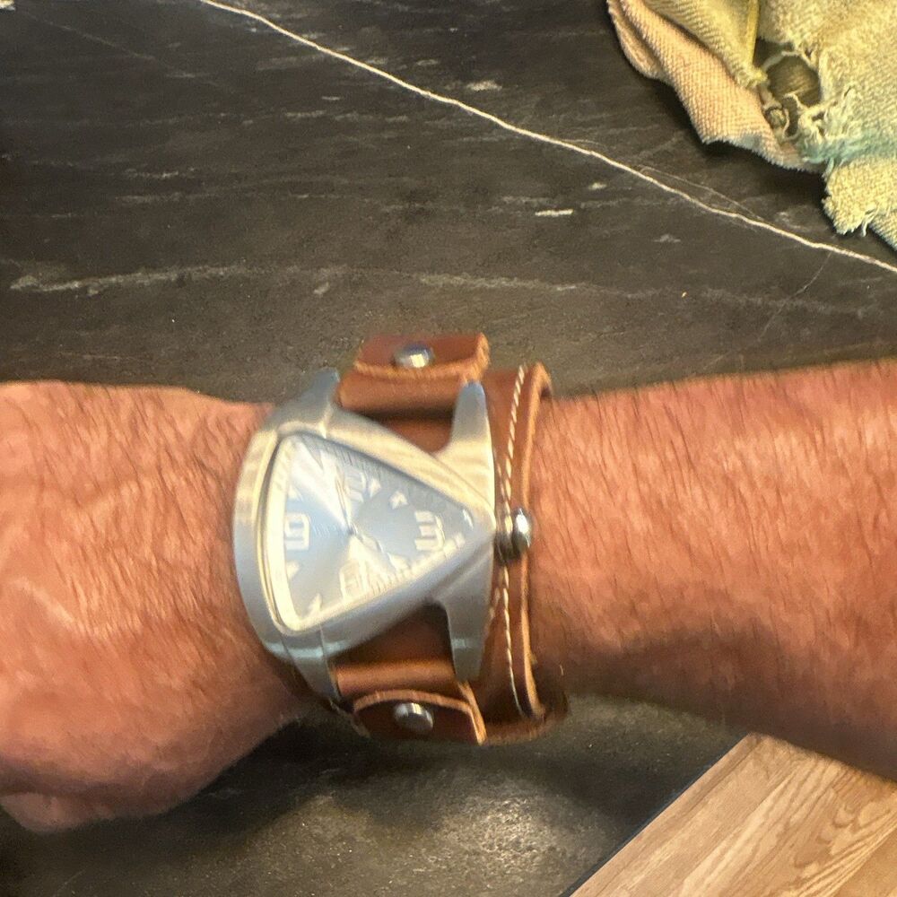 Nemesis Teardrop Silver Watch with Stitched Brown Leather Wide Cuff. DLBB011S